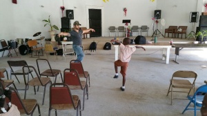 Cody and a child in the church.