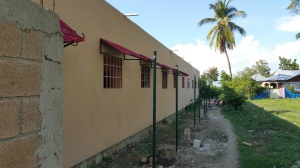 Fenceposts alongside the first school building.
